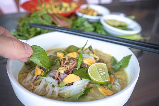 Phnom Penh’s Culinary Underground: Local Food Tour by Tuk-tuk - Stews and stir-fries at a roadside eatery
