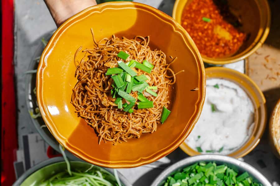 Phuket: Baba Tastes Food Tour with 15+ Tastings - Stop one: spring rolls, betel leaves, and mee hoon