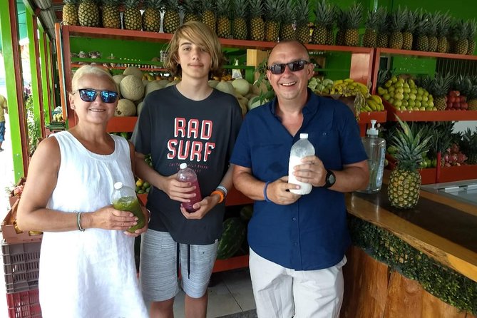 Playa del Carmen Walking Food Tour - Family fruit stalls and fresh Mexican juice