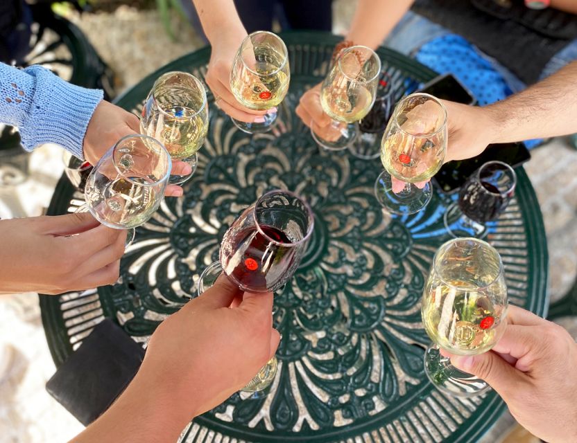 Porto: Wine Tasting with Tapas Walking Tour - Crossing into Porto’s cellar tradition