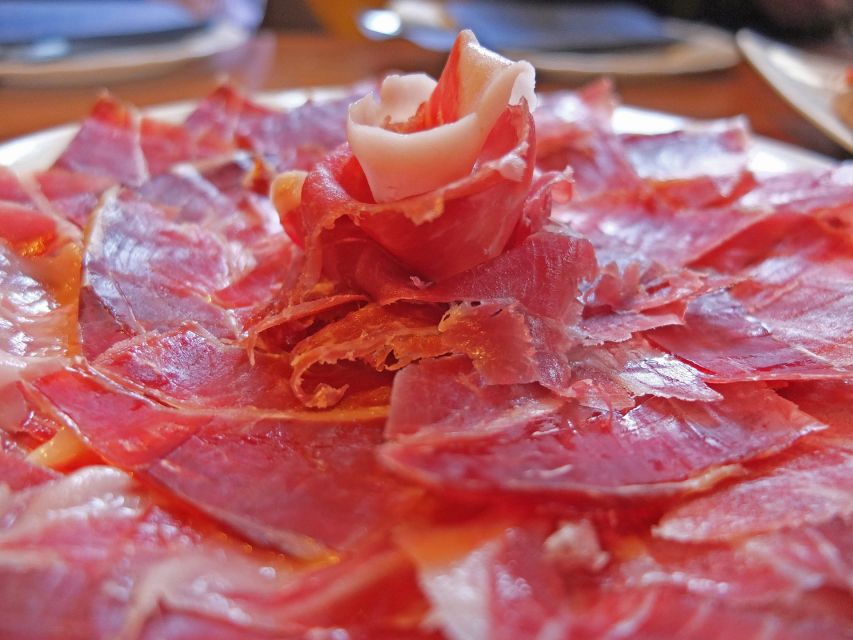 PREMIUM TAPAS TOUR: Paella, Market Tastings, and Winery - Paella near the Cathedral