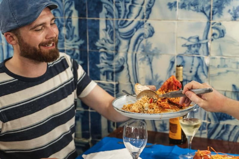 Private Lisbon Food Tour in Baixa with Wine & Local Delights - Rua da Vitória and the main tasting sequence