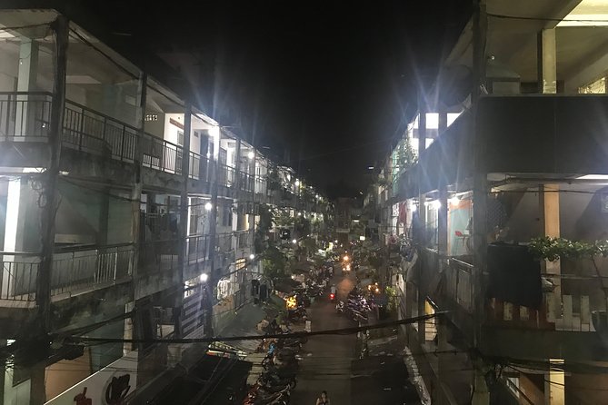 Private Saigon Night Food Tour by Scooter - Stop five: snails, seafood, and Saigon’s late-night food streets