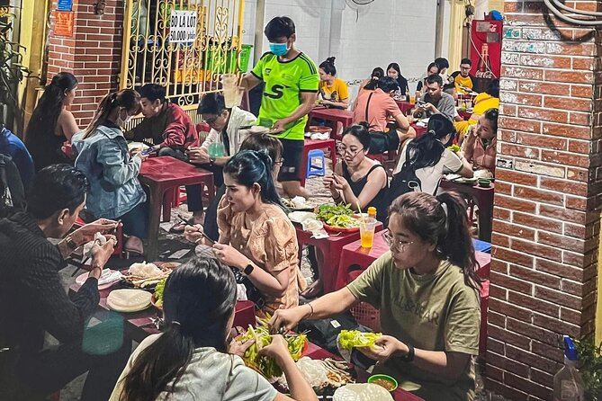Private Street Food Tour by Motorbike/Car with Local Students - Banh mi from a long-running local spot