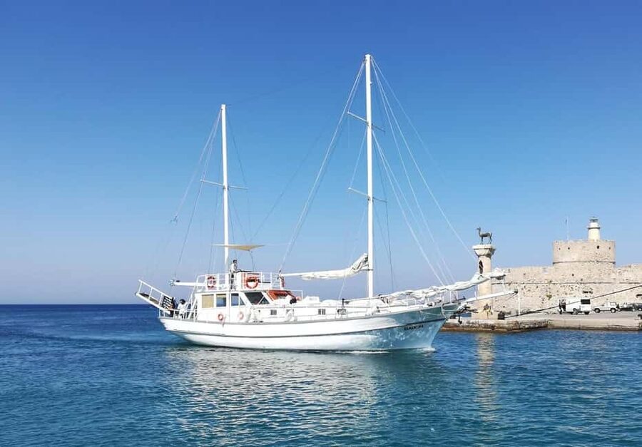 Rhodes: Boat Tour with Snorkeling, Gourmet Buffet & Open Bar - What the $104 price includes