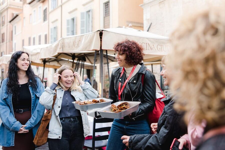 Rome: Food Tour of the Historic Center with Rooftop Spritz - Fried cod and wine at Dar Filettaro
