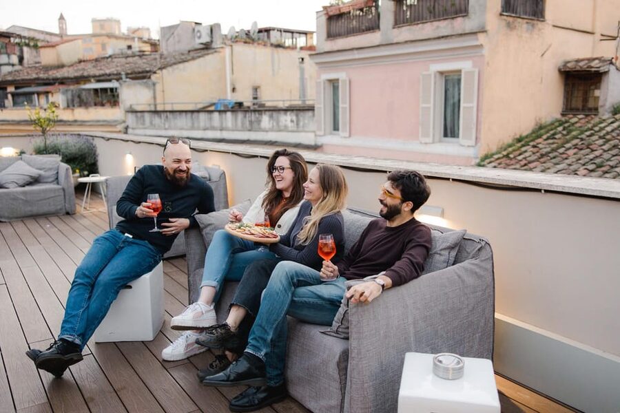 Rome: Food Tour of the Historic Center with Rooftop Spritz - Making a spritz above Trastevere
