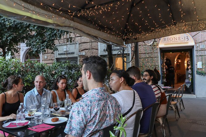 Rome Food Tour & Wine: Trastevere & Campo de' Fiori Like a Local - Supplì al telefono in Piazza Trilussa