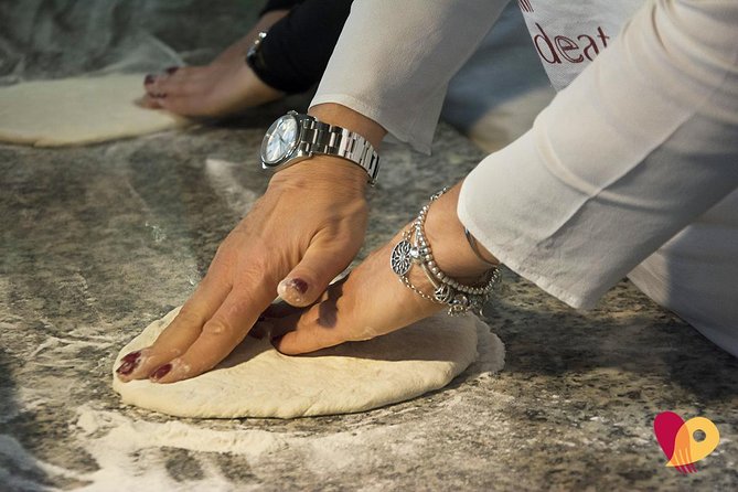 Rome: Pizza Making Class Small Group Experience - Mixing dough and learning the science