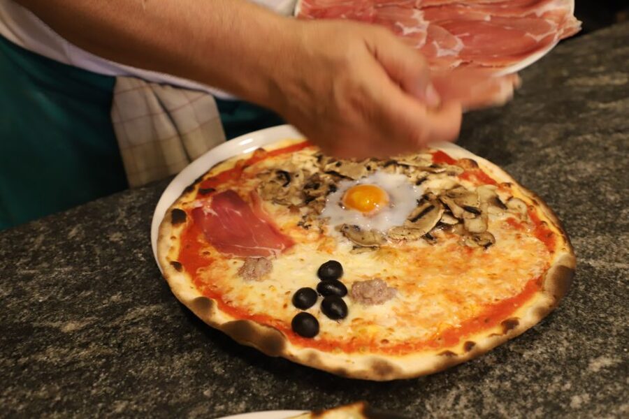 Rome: Trastevere Food and Wine Tasting Tour - Italian wine at an enoteca