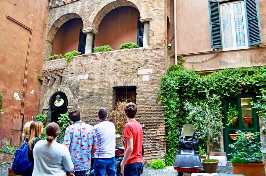 Rome: Trastevere & Tiber Island Street Food Tour at Sunset - Tiber Island to Trastevere, with the city as your backdrop