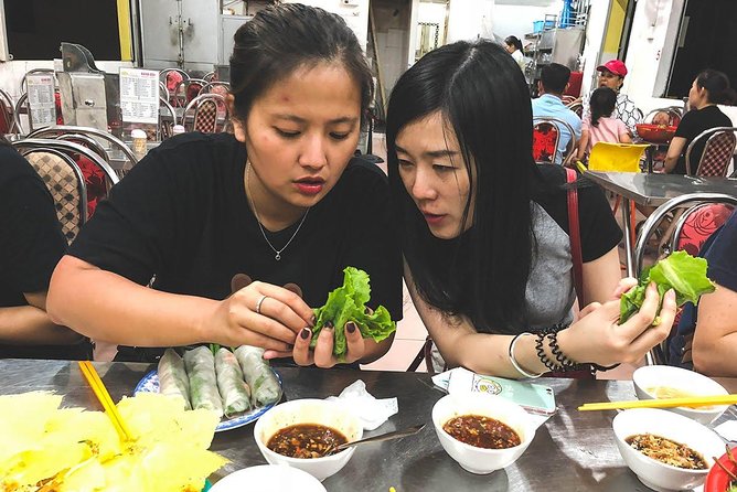 Saigon Afternoon Unseen Street Food by Scooter |Opt: Ao Dai Rider - Banh xeo and wild vegetables at a local restaurant