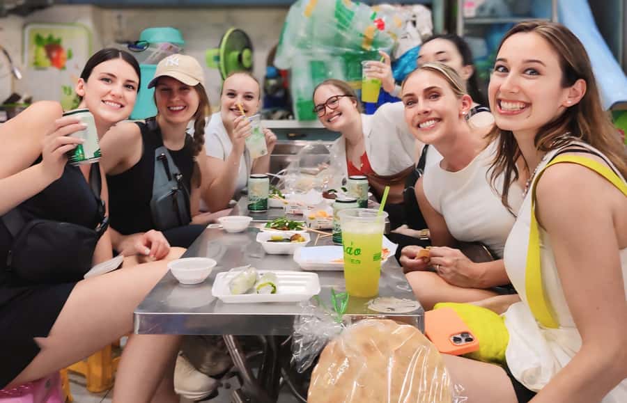 Saigon: Best Price Authentic Food Tour with Female Rider - Markets, flowers, and beef wrapped in betel leaf