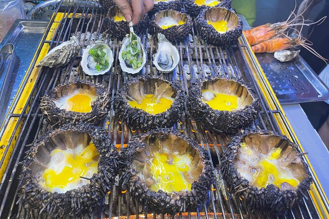 Saigon By Night and Street Food By Motorbike | Opt: Ao Dai Riders - Nguyen Trai Street and the city at street level
