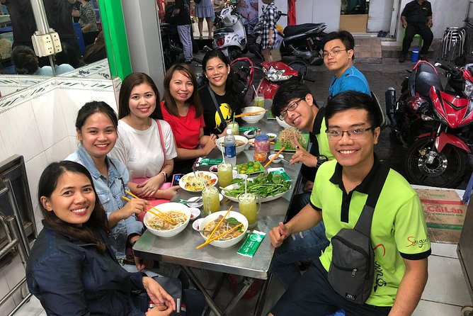 Saigon By Night and Street Food By Motorbike | Opt: Ao Dai Riders - Nguyen Van Cu Bridge and a pause above the river