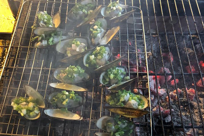 Saigon By Night and Street Food By Motorbike | Opt: Ao Dai Riders - District 4: the final meal in an old local quarter