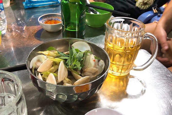 Saigon By Night and Street Food By Motorbike | Opt: Ao Dai Riders - The first plates: grilled noodles and Saigon introductions