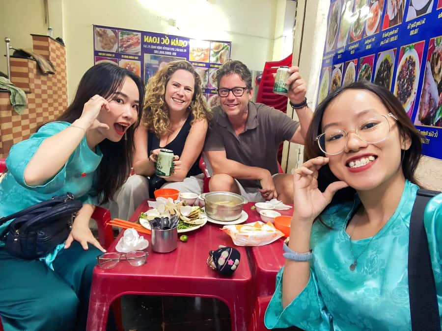 Saigon: Michelin Guide Food Tour with Ao Dai Female Riders - Sticky rice near Ben Thanh Market