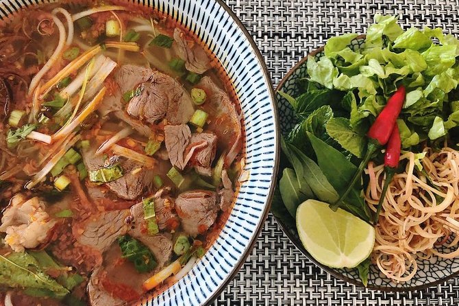 Saigon's Hidden Flavors - Private Street Food Walk with Local Students - Starting with beef noodle soup and a city after dark