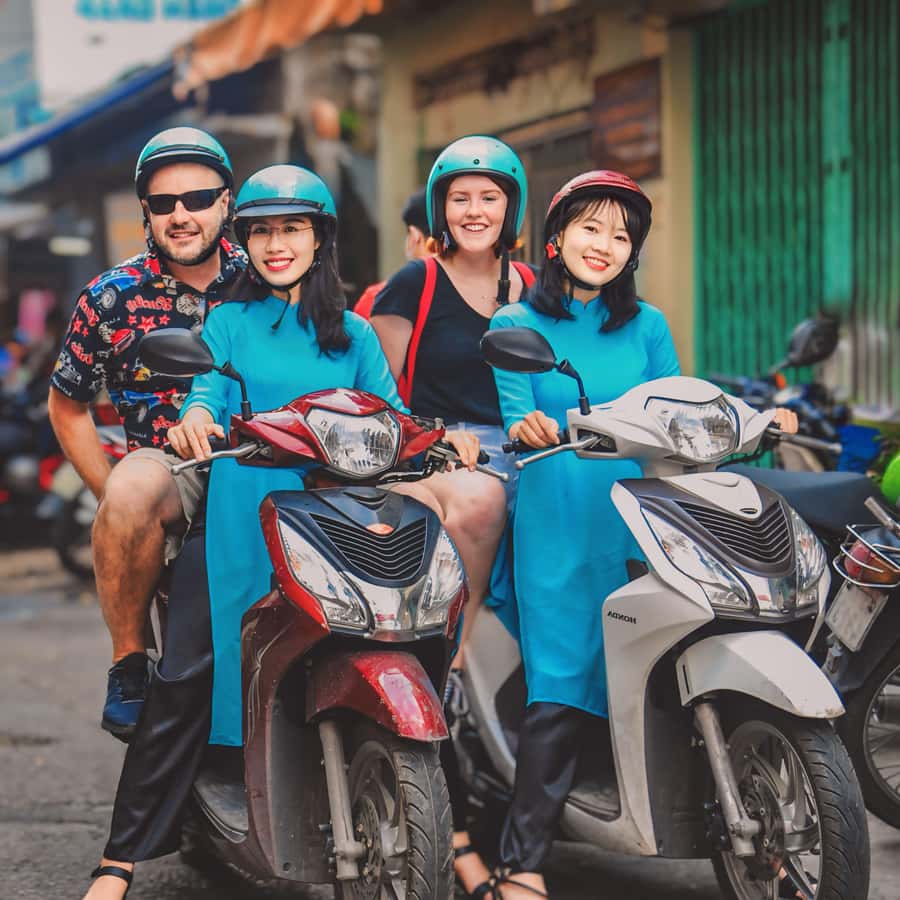 Saigon: Street Food Tasting & Sightseeing Tour by Motorbike - The first ride and Saigon beyond the center