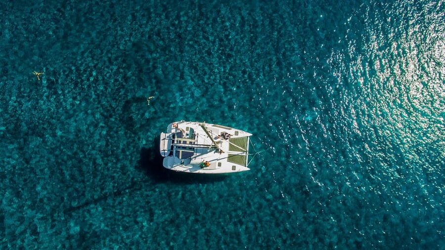 Santorini: Private Catamaran Cruise with Food & Drinks - From Thera to Vlychada Marina