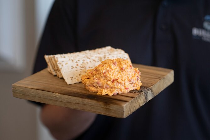 Savor the Flavors of Charleston Walking Food Tour - Walking through the French Quarter with a plate in hand