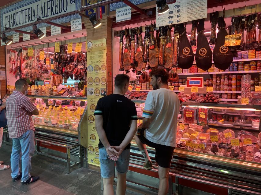 Seville: Flavors of Andalucía Guided Food Tour with Tastings - The first bar: sherry, shared plates, and local customs