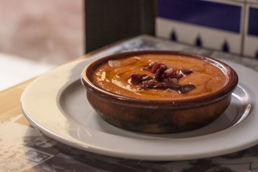 Seville: Food Tour with 10 Tastings of Tapas, Ham, Churros - Pork cheeks, oxtail, and the slower side of Andalusia