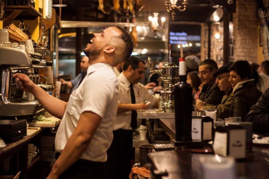 Seville: Food Tour with 10 Tastings of Tapas, Ham, Churros - Tapas first, with Seville on the plate