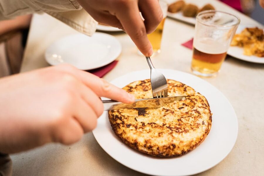 Seville Food Tour with Tapas & Drinks with a Local - Churros in winter, ice cream in summer