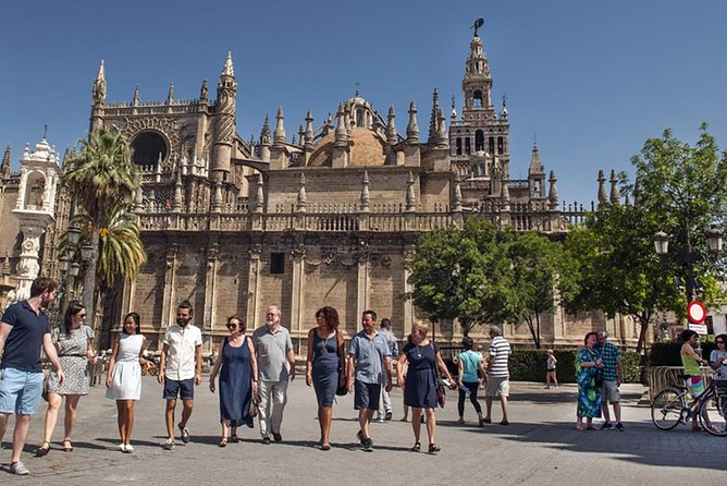 Seville Ultimate Food Tour - Walking through three central neighborhoods
