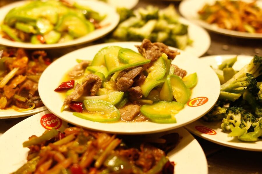 Shanghai: 3-Hour Local Food Tasting Tour - Yunnan Road, Huaihai Road, and the local restaurant stops