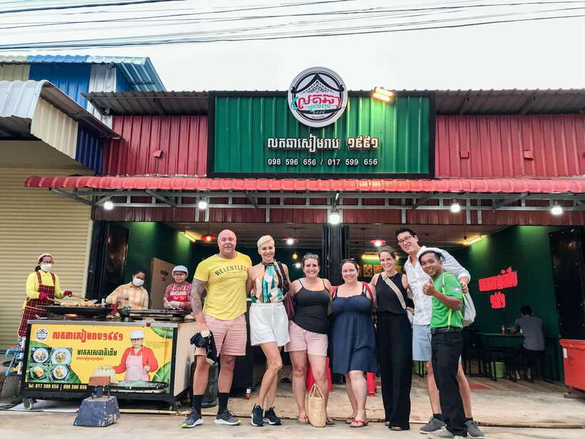 Siem Reap: Evening Food Tour with 10 Local Tastings - Lort cha starts the meal with hands-on flavor
