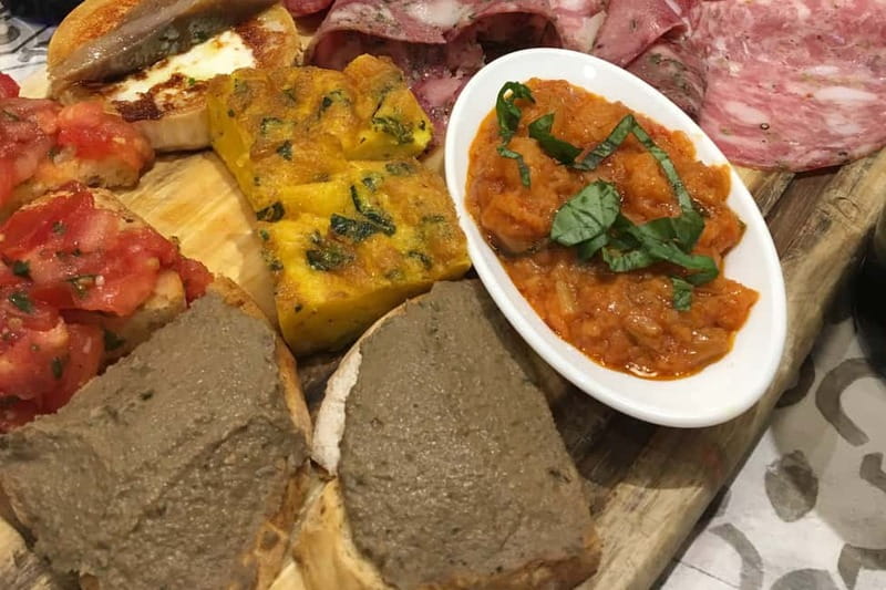 Siena: Guided Walking Food Tour with Full Meal - Wine and Tuscan food at the first restaurant