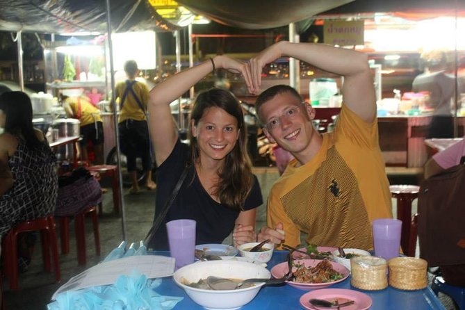 Small-Group Chiang Mai Evening Street Food Tour - Riding a songthaew between food stops