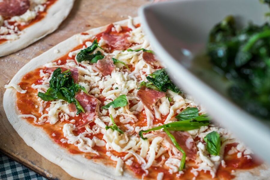 Sorrento: Pizza Making Class at Tirabusciò Cooking School - Choosing toppings and baking your own pizza