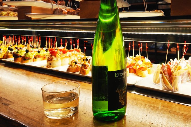 Spanish Wine and Tapas Tour in a Local Neighborhood in Barcelona - Four stops, four glasses, many flavors