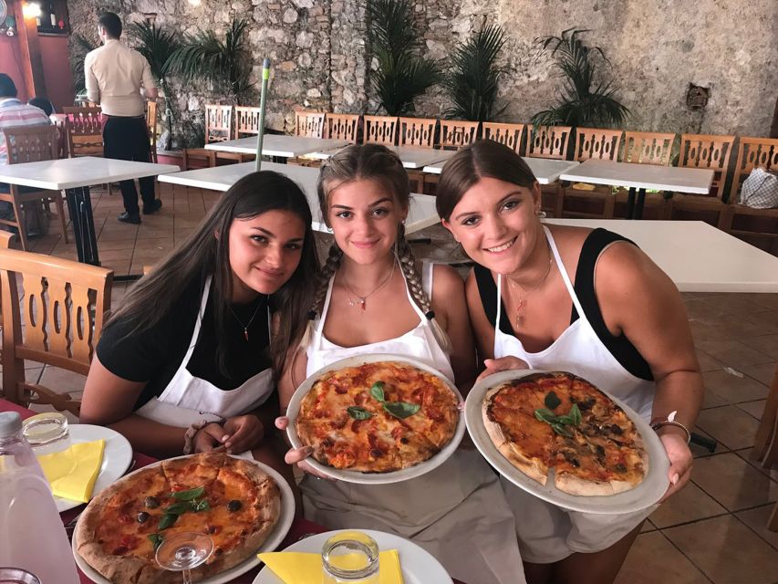 Taormina: Half-Day Pizza Making Class - Eating the results at one long table