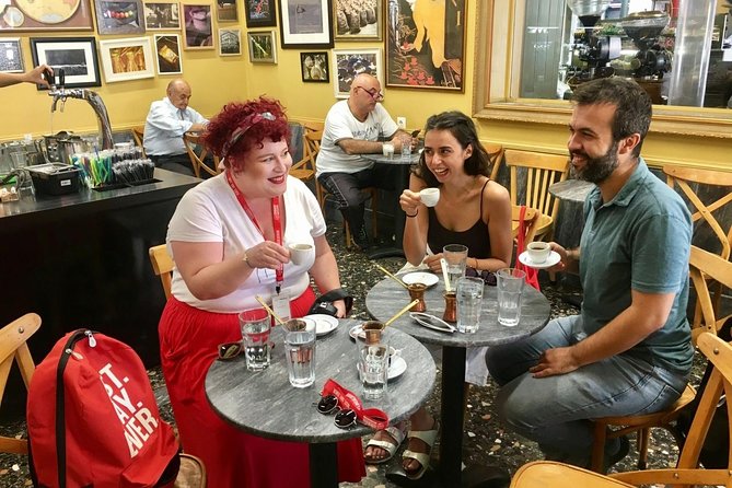 Tastes of Athens: Your Private Greek Feast Tour - Local deli shopping on Athens Street