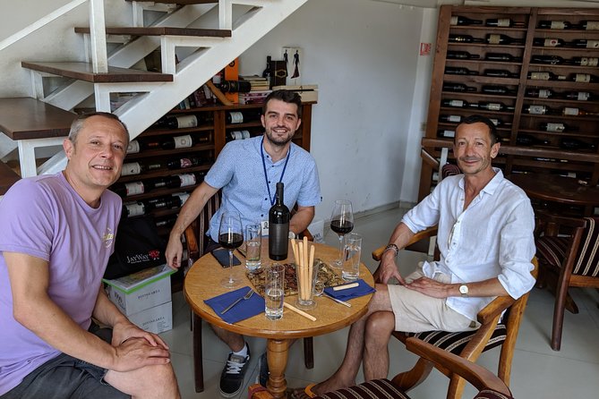 Traditions in Bucharest: Village Museum and Wine Tasting Tour - Romanian wine at a historic Old Town bar