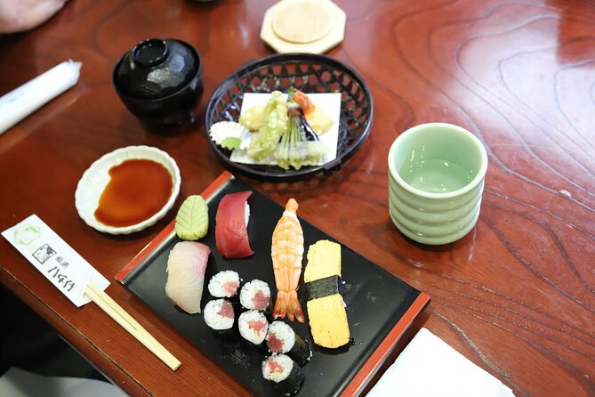 Tsukiji Fish Market Guided Tour and Sushi Making with Pro Chef - Moving from market sights to sushi skills
