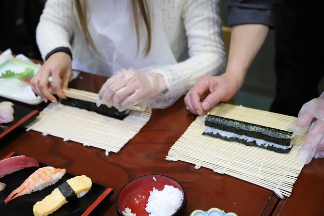 Tsukiji Fish Market Guided Tour and Sushi Making with Pro Chef - Walking through the outer Tsukiji market