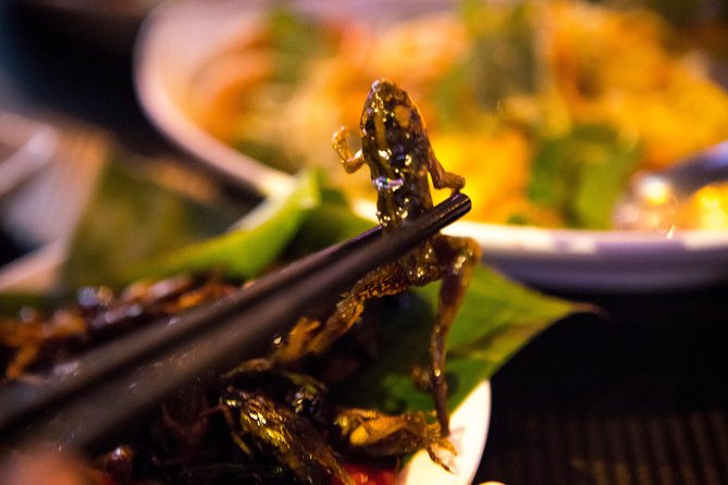 Ultimate Phnom Penh Food Tour by Tuk Tuk: 20 Tastings and Drinks - Royal Palace back streets and an old Cambodian dish