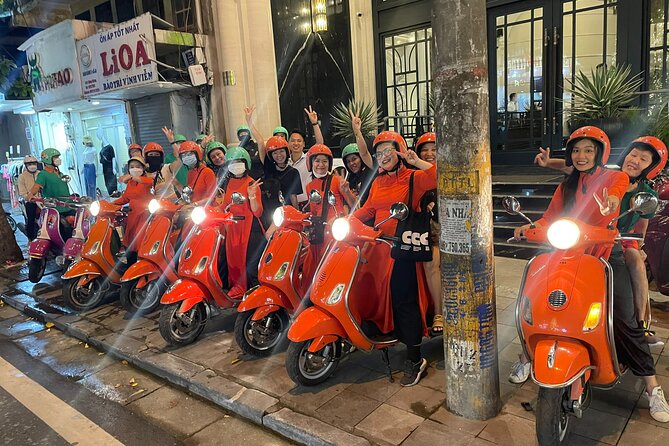 Vespa Female Ao Dai riders Night Street Food + See Train Street - The Old Quarter start sets the tone