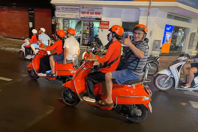 Vespa Female Ao Dai riders Night Street Food + See Train Street - Ngu Xa and Truc Bach turn dinner into a tasting session